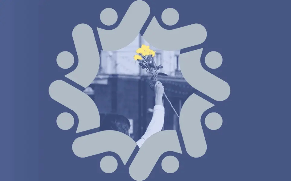 A girl lifts her arm, holding a bunch of yellow flowers to show friendship and teamwork.